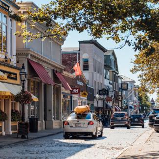 Newport's Thames St. Picture of cobblestone street and historic buildings
